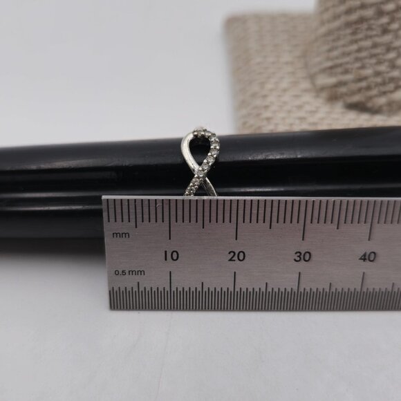 Size 7 Sterling Silver Bright Cubic Zirconia Infinity Ring A3488 - Picture 7 of 8